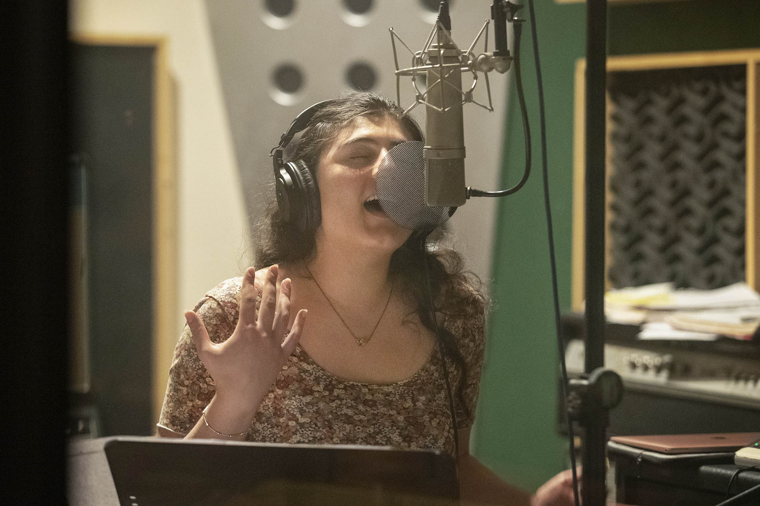 Student singer Tina Hashemi recorded a distinguished majors project and contributed to John D’earth’s “Infernal Resilience” project. (Photos by Dan Addison, University Communications)