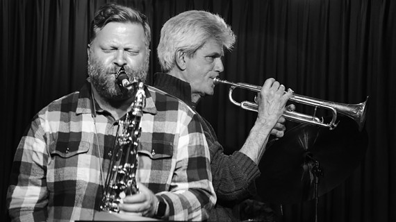 An image of J.C. Kuhl and John D'earth on trumpet.
