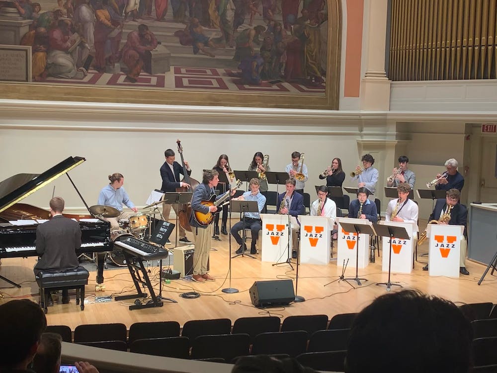 An image of Michael McNulty and other musicians on stage at Old Cabell 