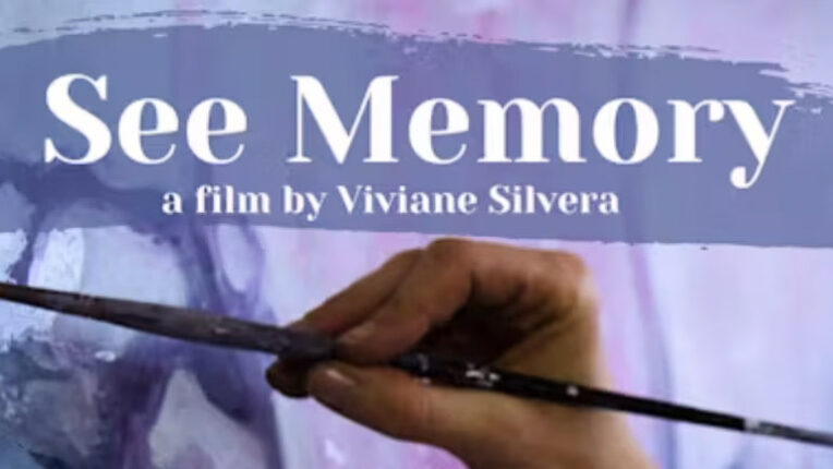 A close up photo of a hand using a paintbrush to paint a purple mural, and the title phrase "See Memory a film by Viviane Silvera" in white typed letters across the top.