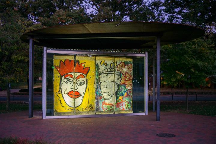 A picture of a piece of the Berlin wall on UVA grounds. 